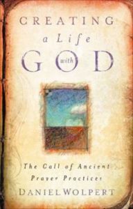 Cover of the book Creating a Life with God by Daniel Wolpert featuring vague artwork of sky and earth